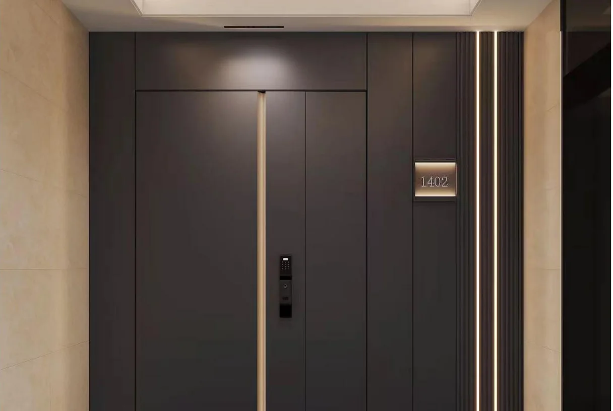 Dark bronze cast-aluminium entrance pair with a vertical brass pull and a brass trim, design rendering