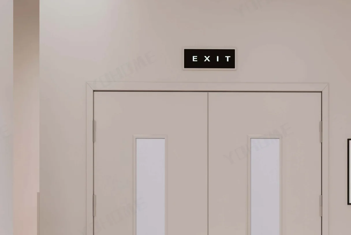Double-leaf steel escape door with an exit sign and vision panels in a light public corridor, design rendering