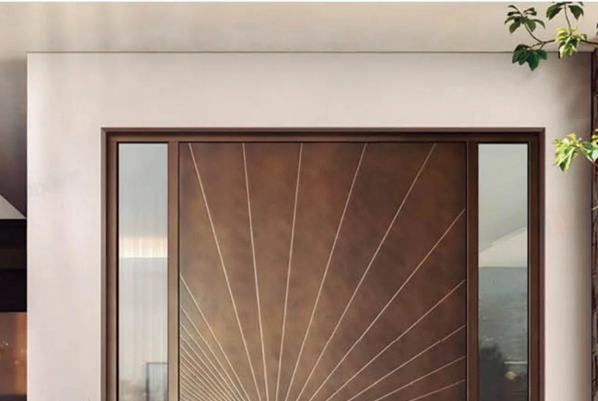 Bronze pivot entrance door with a radiating sunburst pattern between mirrored side panels, design rendering