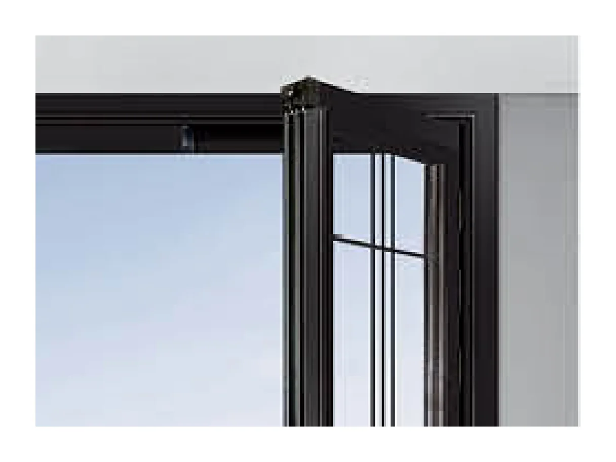 Close view of the head rail, folded leaf corner and running gear on the PT push-slide door