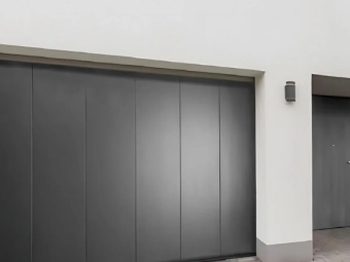 Aluminium side sliding garage door leaf running along the wall on a low track, design rendering