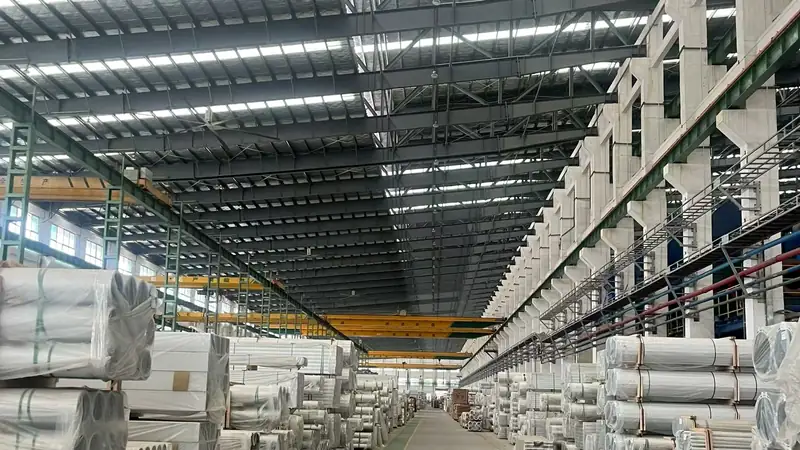 Packed aluminium profiles in the warehouse aisle