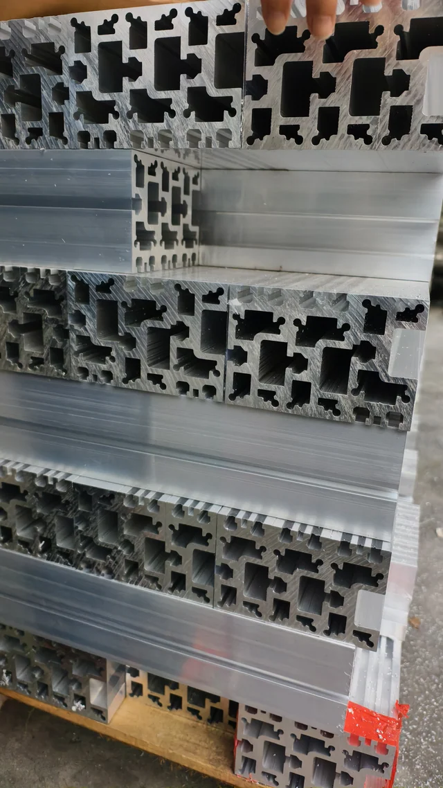 Cast aluminium door profiles on production racks