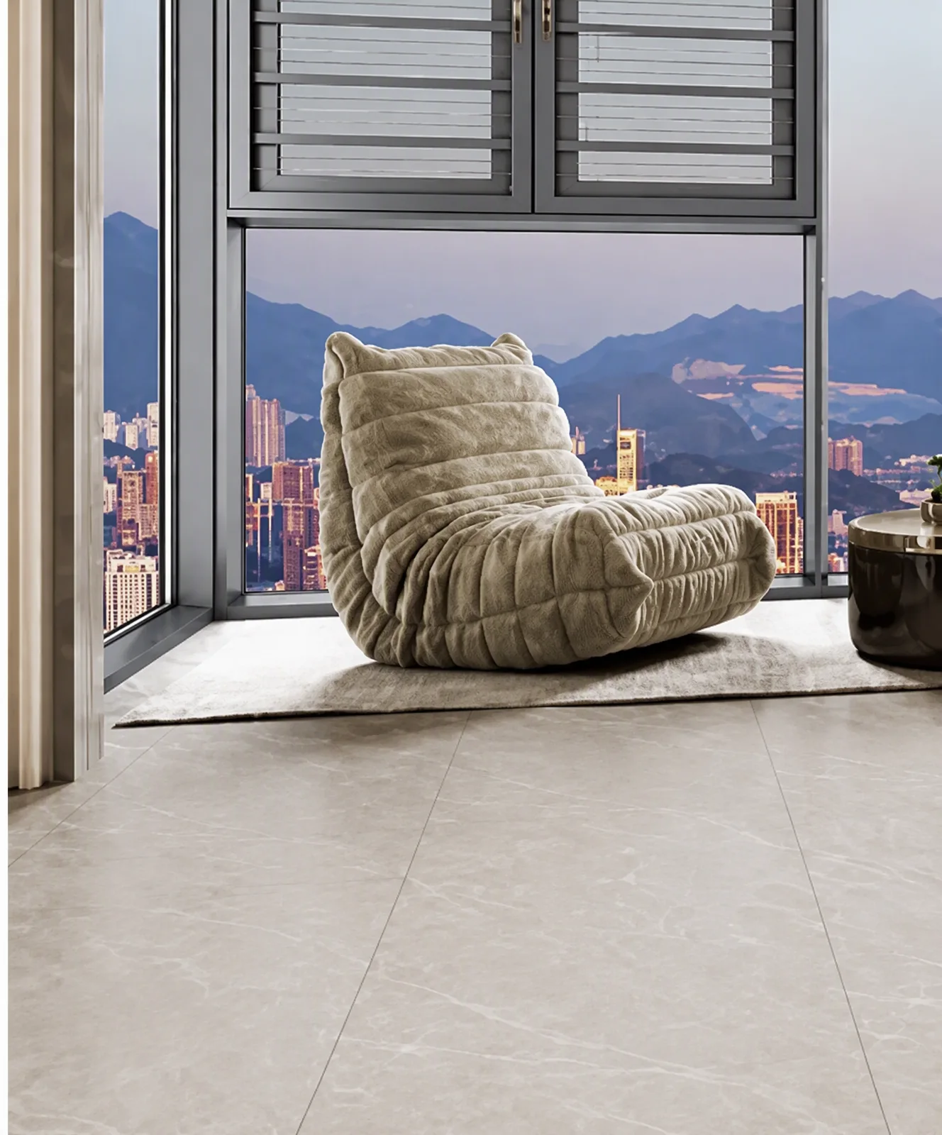 Living room with a full-height window wall overlooking a city and mountains