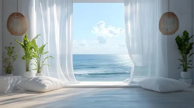Bedroom with sheer curtains and a window set facing the sea