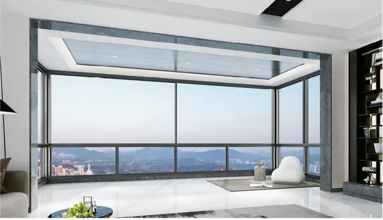 Penthouse living room with 126 series six-track panorama glazing over a valley
